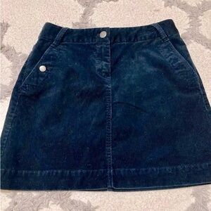 JCrew women’s Navy Skirt size 4 mini corduroy with side pockets.